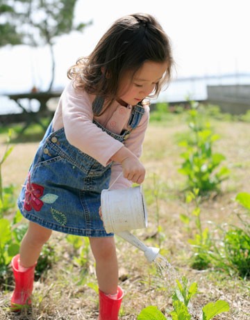 girl watering