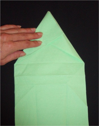 Folding a Christmas Tree Napkin craft for kids