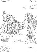 Pony playing with a cricket