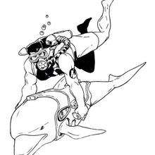 Action Man diving with a dolphin - Coloring page - SUPER HEROES Coloring Pages - ACTION MAN coloring pages