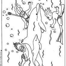 Children in the middle of dolphins coloring page