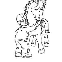 Girl feeding a horse coloring page