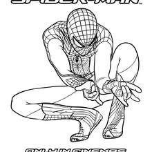 The amazing Spiderman ready to shoot his webs coloring page