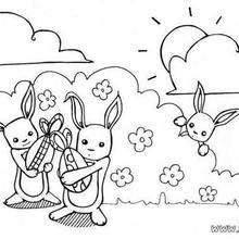 Bunnies fond of chocolate eggs coloring page