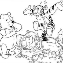 Winnie, Tigger and Piglet playing with a boat coloring page